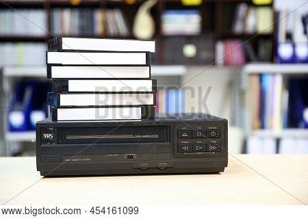 Video Cassette Tape Vhs Old Retro Style Stack On Video Record Player Concept Of Vintage Electric And