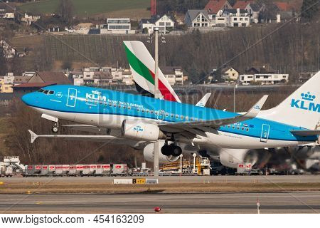 Zurich, Switzerland, February 10, 2022 Klm Boeing 737-7k2 Airplane Is Taking Off From Runway 28 At T