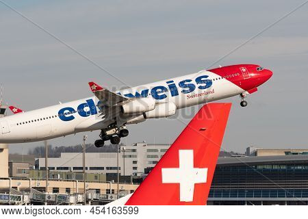 Zurich, Switzerland, February 10, 2022 Edelweiss Air Airbus A340-313 Aircraft Taking Off From Runway