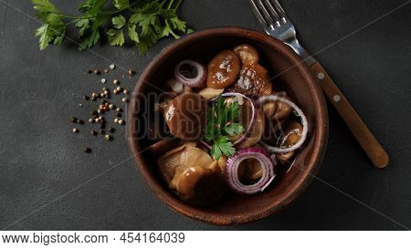 Salted Mushrooms, Lactarius Resimus, Autumn Harvest. Homemade Pickled Mushrooms, Marinated Red Onion