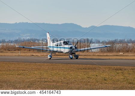 Wangen-lachen, Switzerland, February 13, 2022 Piper Pa-28-161 Warrior Ii Is Arriving On A Small Airf