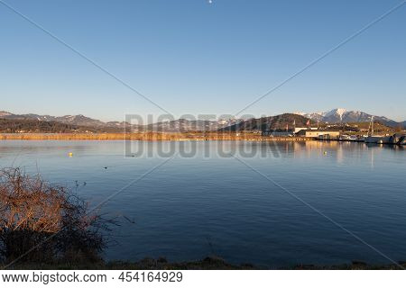 Wangen-lachen, Switzerland, February 13, 2022 View Over The Lake Of Zurich To The Small Airfield On 