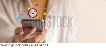 Customer Experiences Concept. Happy Client Using Smartphone To Reading Review Rating For Online Sati