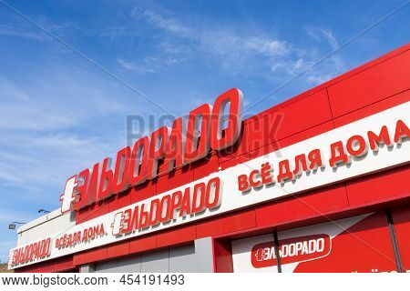 Krasnoyarsk, Russia - May 5, 2022: Logo Of Electronic Hypermarket Eldorado Against Blue Sky. Eldorad