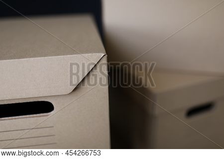 Close-up Of Empty Solid Cardboard Boxes With Covers, Beige Containers To Storage Things. Full Packag