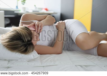 Portrait Of Young Woman Stay At Home, Belly Hurts, Suffering Menstrual Period Pain, Lying On Couch H