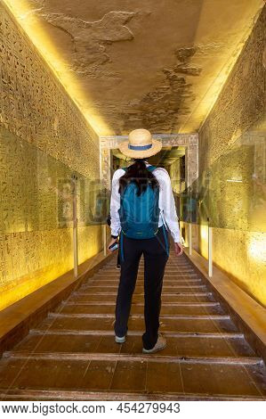 Woman Traveler At Tomb Of Pharaoh Rameses Iii In Valley Of The Kings, Luxor, Egypt