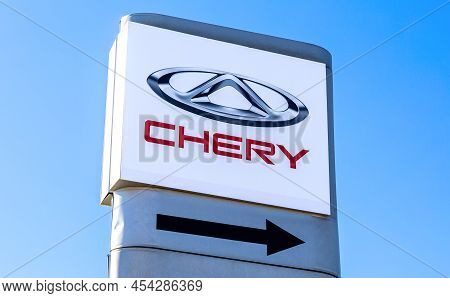 Samara, Russia - May 07, 2022: Official Dealership Sign Chery Automobile Against A Blue Sky. Chery I