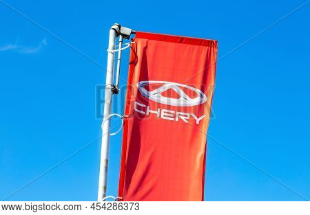 Samara, Russia - May 07, 2022: Official Dealership Sign Chery Automobile Against A Blue Sky. Chery I