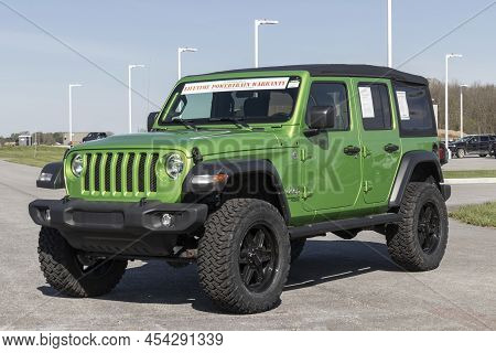 Tipton - Circa May 2022: Used Jeep Wrangler Display At A Dealership. With Supply Issues, Jeep And St
