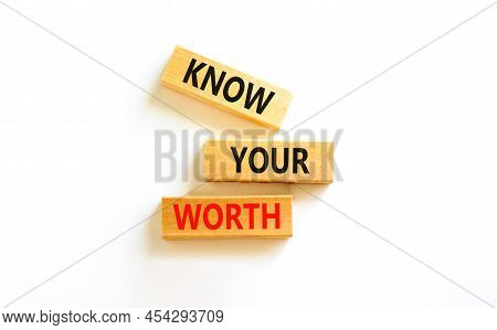 Know Your Worth Symbol. Concept Words Know Your Worth On Wooden Blocks. Beautiful White Table White 