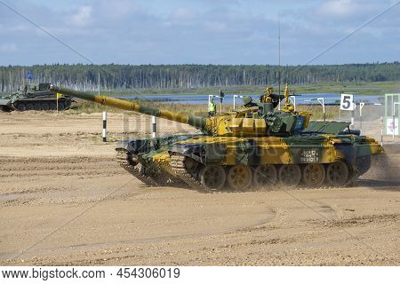 Alabino, Russia - August 25, 2020:: Yellow Tank T-72b3 Of The Kazakh Team On The Tank Biathlon Track