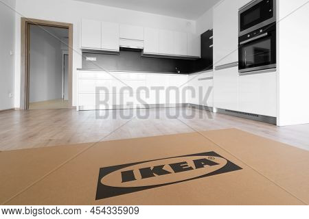Celadna, Czechia - 05.07.2022: Cardboard Boxe With Ikea Logo On The Floor In Otherwise Empty Kitchen