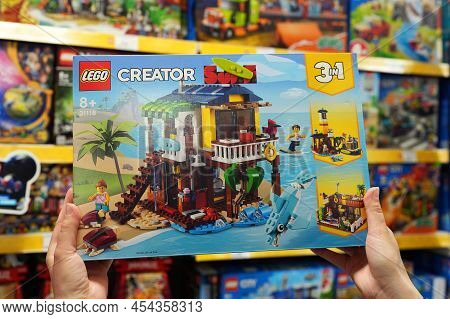 Closeup Of Boxes With A Lego Constructor In Hands Of Buyer. Lego Is A Popular Line Of Construction T