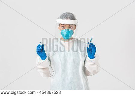 Covid-19, Coronavirus Disease, Healthcare Workers Concept. Amazed And Excited Female Asian Doctor, I
