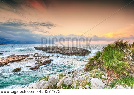 Breathtaking Evening Seascape Of Isolidda Beach On San Vito Cape. Popular Travel Destination Of Medi
