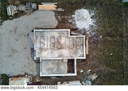 Aerial View Of Building Works Of New House Concrete Foundation On Construction Site