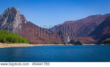 View Of The Green Water Of The Oymapinar Dam With Green Trees On The Shore