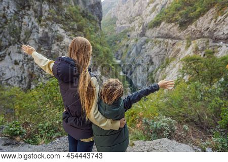 Mom And Son Tourists In The Background Of Beautiful Canyon Of Moraca River In Winter, Montenegro Or 