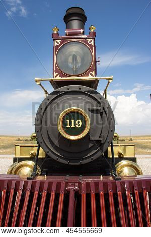 Locomotive. Front View Of A Antique Train In The United States.
Old Locomotive In The Desert Of Utah