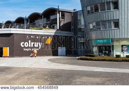 Maaseik, Limburg, Belgium - 04 12 2022 - The Colruyt General Grocery Store And The Pearl Chain