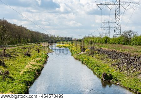 The Reflecting Water Of The Schroevendaalse Plas Near The River Maas Around Laak, The Netherlands