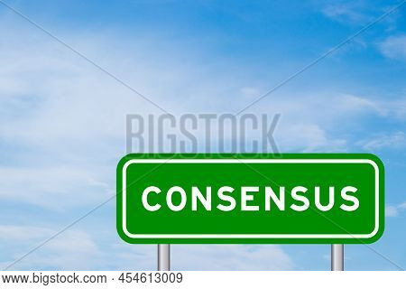 Green Color Transportation Sign With Word Consensus On Blue Sky With White Cloud Background
