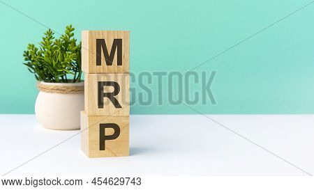 Mrr - Word From Wooden Blocks With Letters. Business Concept On Green Background. Copy Space Availab