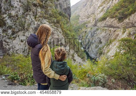 Mom And Son Tourists In The Background Of Beautiful Canyon Of Moraca River In Winter, Montenegro Or 