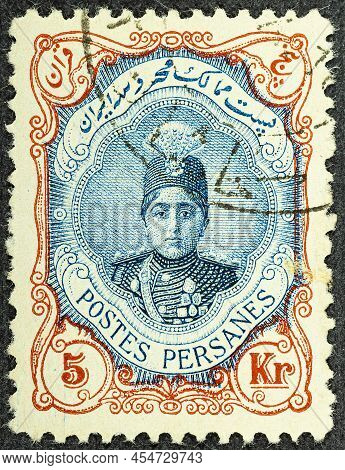 Persia Circa 1922. Cancelled Postage Stamp Printed By Persia, That Shows Ahmad Shah Qajar In An Orna