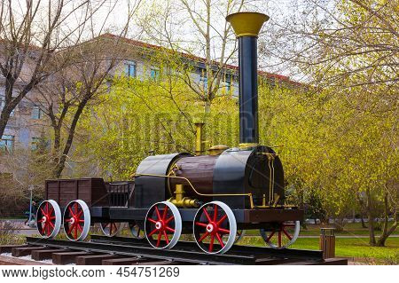 Krasnoyarsk, Russia - May 5, 2022: Model Of Cherepanov Steam Locomotive. Monument To The First Steam