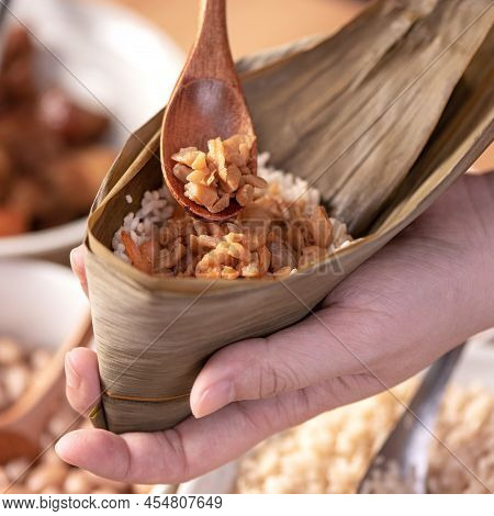 Making Zongzi Food - Preparing And Wrapping Chinese Rice Dumpling.