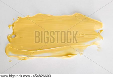 Yellow Car Polishing Paste, Close-up. Finishing Car Body Polish. White Background, Isolate, Macro