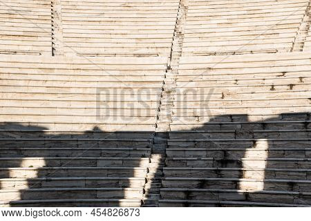 Athens, Attica , Greece - 12 26 2019 Abstract View Over The Steps And Marble Seats Of The Dyonisus T