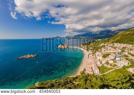 Aerophotography. View From Flying Drone. Panoramic View Of Sveti Stefan Island In Budva In A Beautif