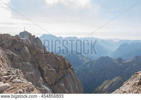 The View Of Punta Rocca 3309 M , With The Mountain Station For The Malga Ciapela Cable Car, Italian 