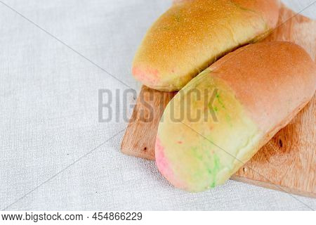 Rainbow Long John Buns Bread With Copy Space For Text