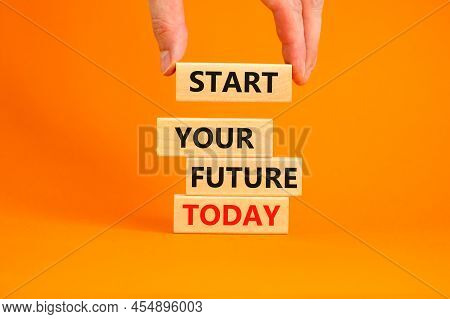 Start Your Future Today Symbol. Concept Words Start Your Future Today On Wood Blocks. Businessman Ha
