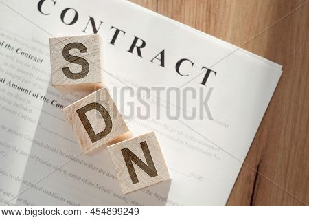Sdn Acronym For Software Defined Networking Written On Wooden Cubes Lying On The Contract On Wooden 