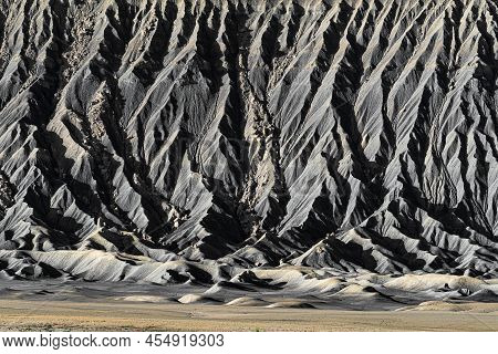 Textured Detail Of The Based Of Eroded Butte In The Caineville Badlands Of Utah