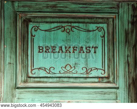 Signboard For A Shop Or Cafe, With The Inscription, Breakfast. Green Color On An Old Type Of Board. 