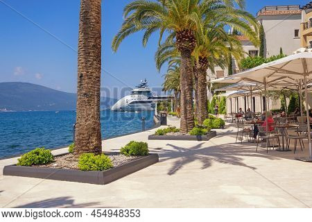Tivat, Montenegro - May 13 2022 :  View Of Embankment  Of Tivat City. Olivia O Yacht. Bay Of Kotor, 