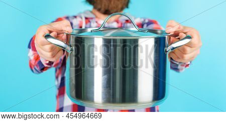 Cooking Utensil For Food Preparation. Saucepan With Lid. Kitchenware. Advertising. Selective Focus.