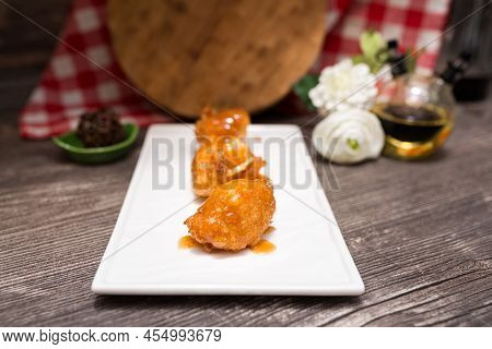 French Savory Pet-de-nonne Doughnuts Made Of Custard Dough With Salted Caramel