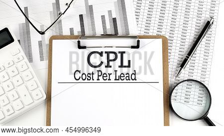 Paper With Cpl On Chart With Calculator,pen And Magnifier