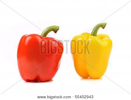 Red and yellow peppers with tails