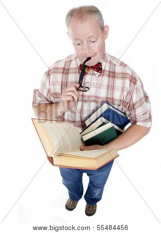 Middle Aged Man Reading A Book