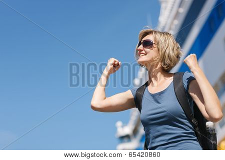 Woman with map, in front of cruise liner
