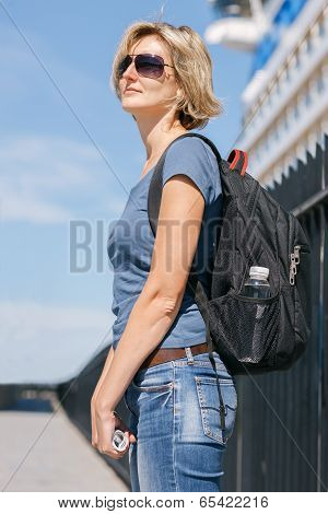 Woman tourist with backpack