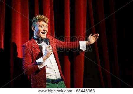Anchorman Talking To Spectators And Announcing Show
